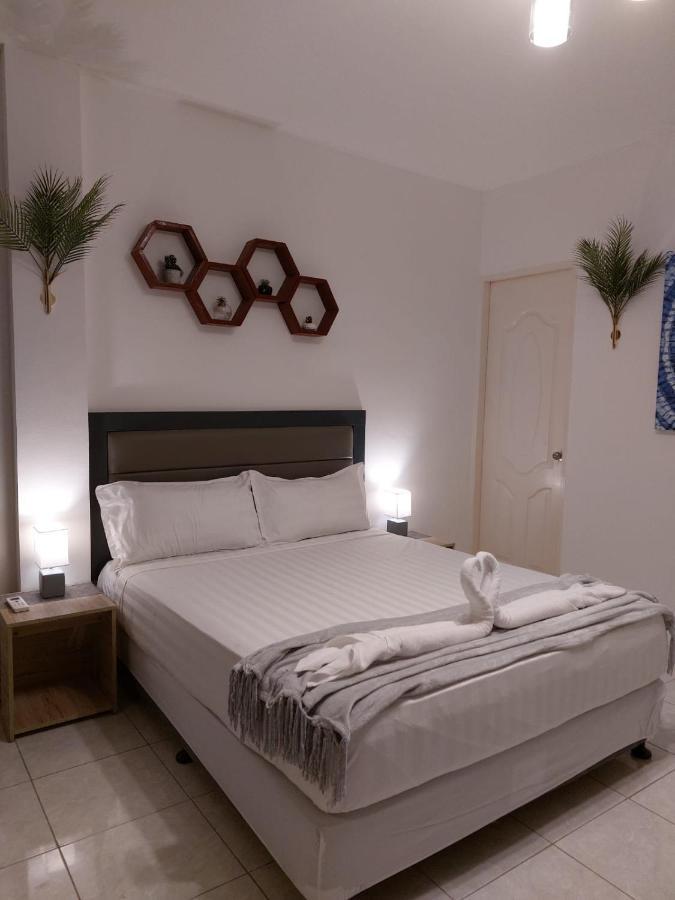 Bonsai Jacuzzi Suites Panglao Bagian luar foto