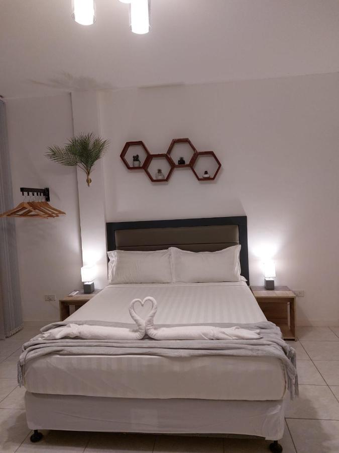 Bonsai Jacuzzi Suites Panglao Bagian luar foto
