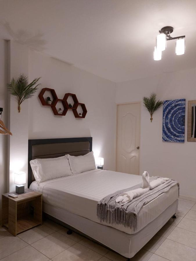 Bonsai Jacuzzi Suites Panglao Bagian luar foto